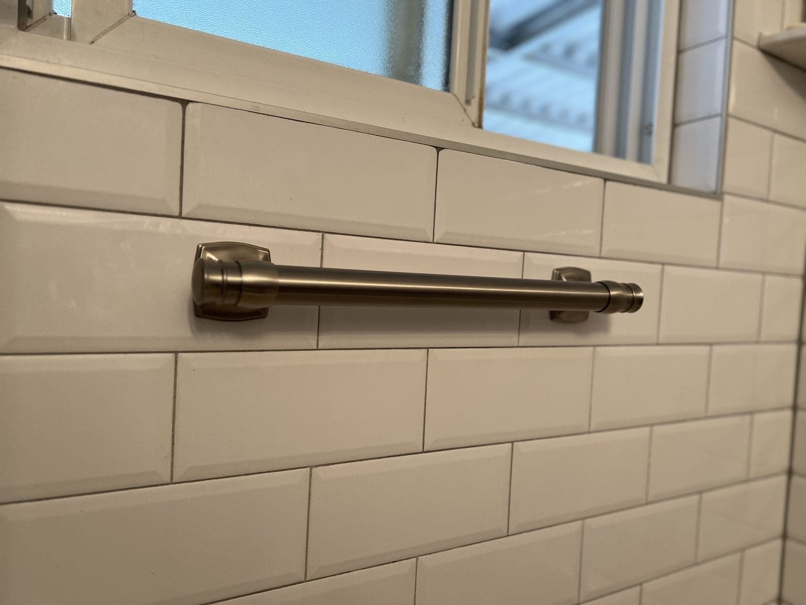 Subway tile & grab bar